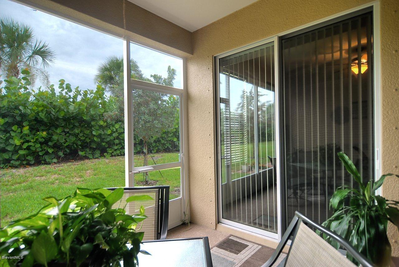 620 Bismarck Way Indialantic, FL 32903 - Photo 9 of 14 a view of backyard with green space