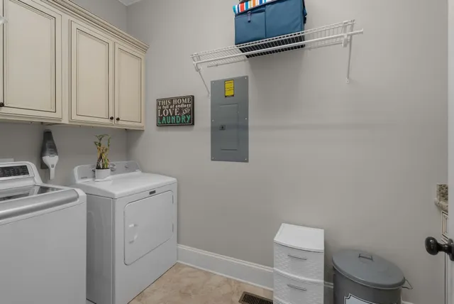 a bathroom with a toilet sink and vanity