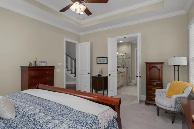 a bedroom with a bed and furniture