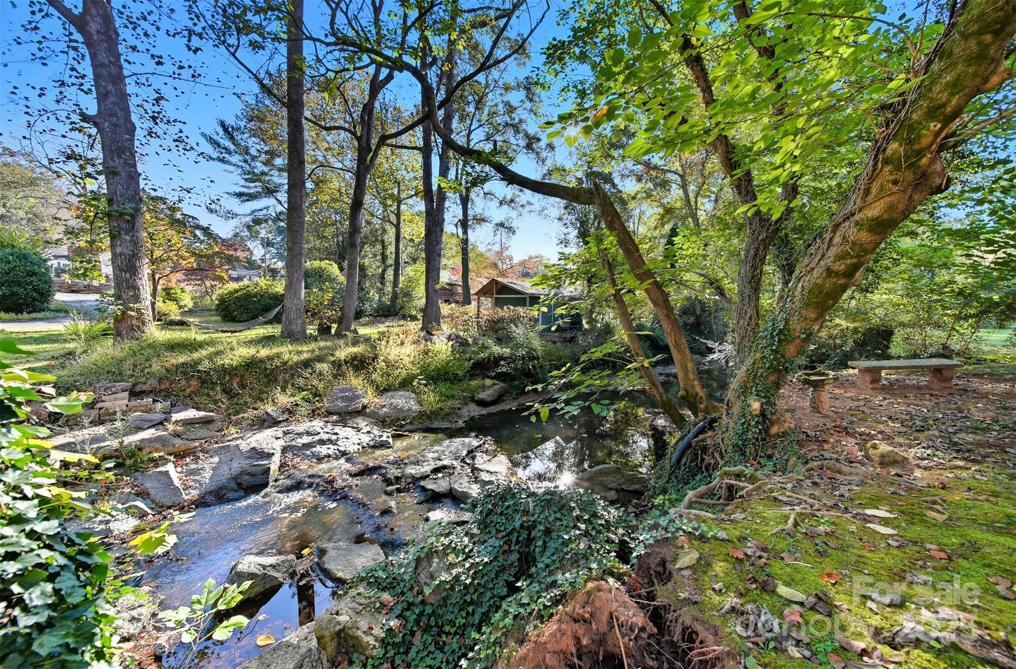 824 6th Street Northwest, Unit 5 Hickory, NC 28601 - Photo 32 of 33 a backyard of a house with a yard and outdoor seating