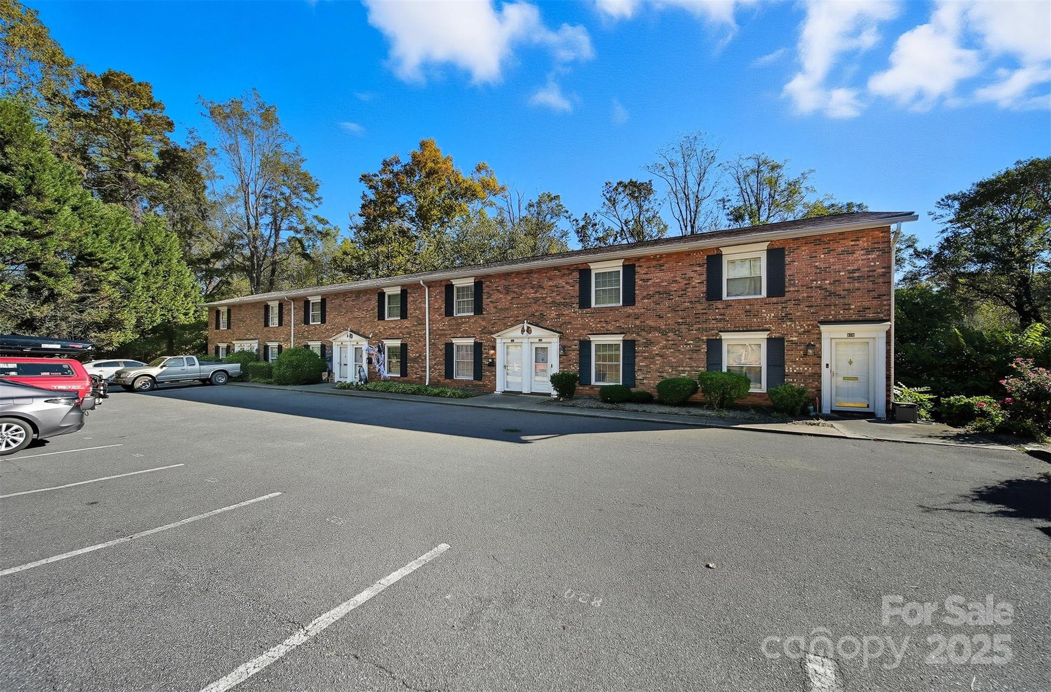 824 6th Street Northwest, Unit 5 Hickory, NC 28601 - Photo 33 of 33 a front view of a house with a yard and parking