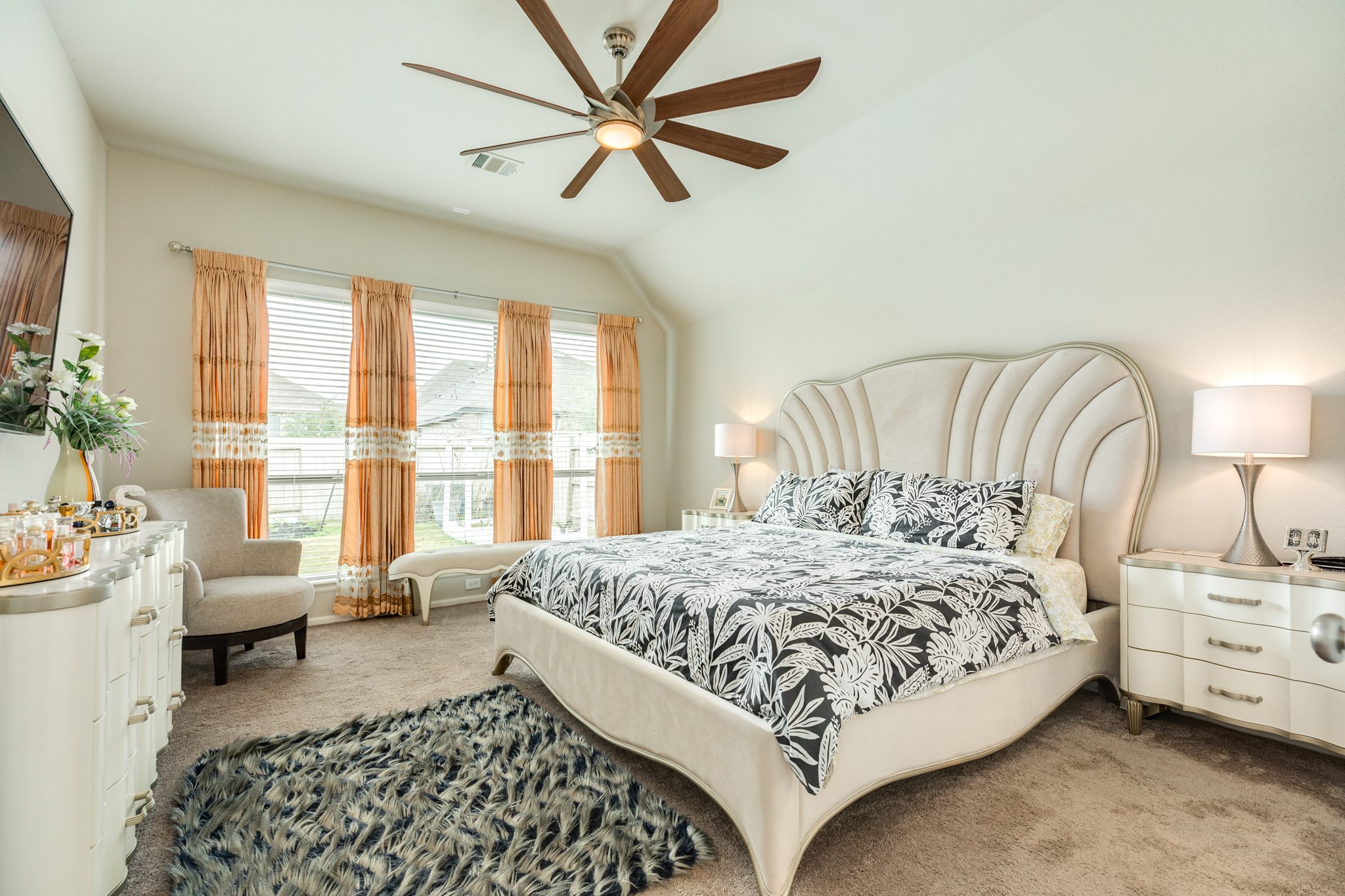 5138 Walnut Grv Lane Manvel, TX 77578 - Photo 23 of 43 a bedroom with a bed a couch and a chandelier