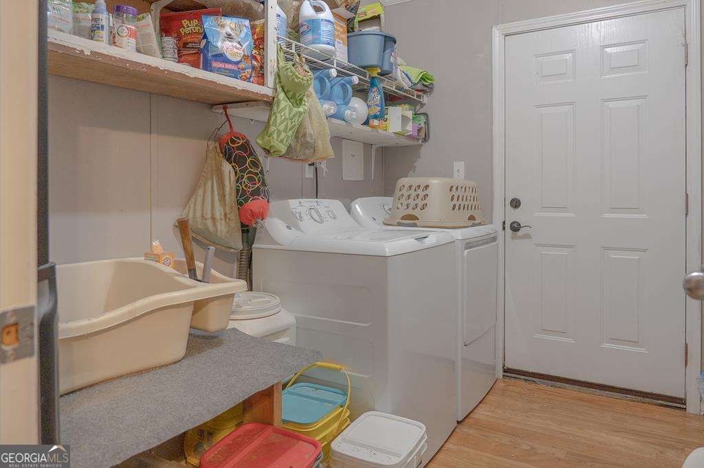 714 Yates Road Bowdon, GA 30108 - Photo 22 of 28 a bathroom with a sink a toilet and shower