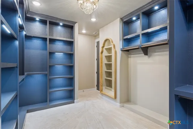 a view of a hallway with closet