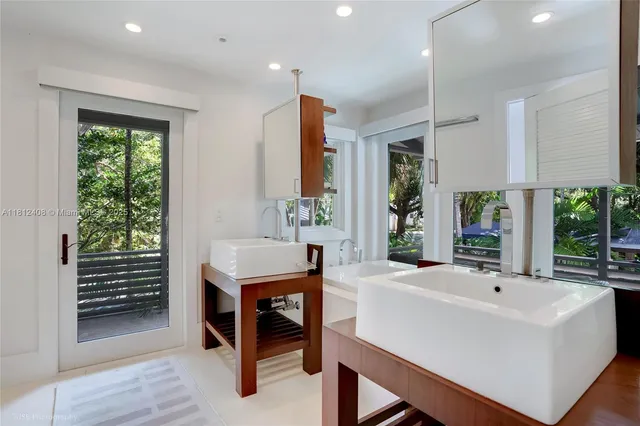 a dining room with table and chairs