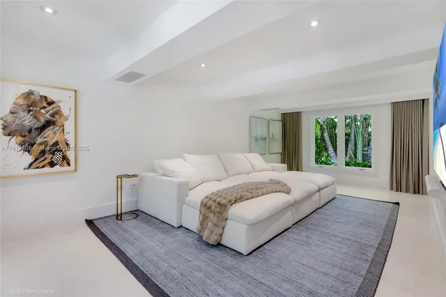 a bathroom with a sink toilet vanity and shower