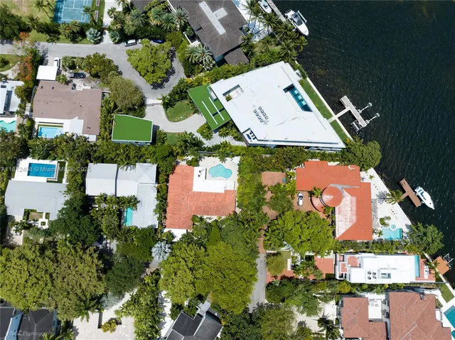 a front view of a house with a yard table and chairs
