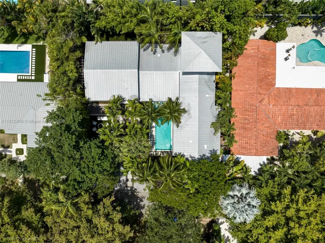 a chair and table sitting in front of a building