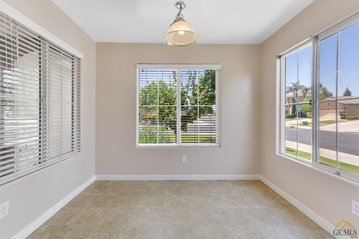 Undisclosed Address Bakersfield, CA 93311 - Photo 14 of 39 a view of an empty room with a window