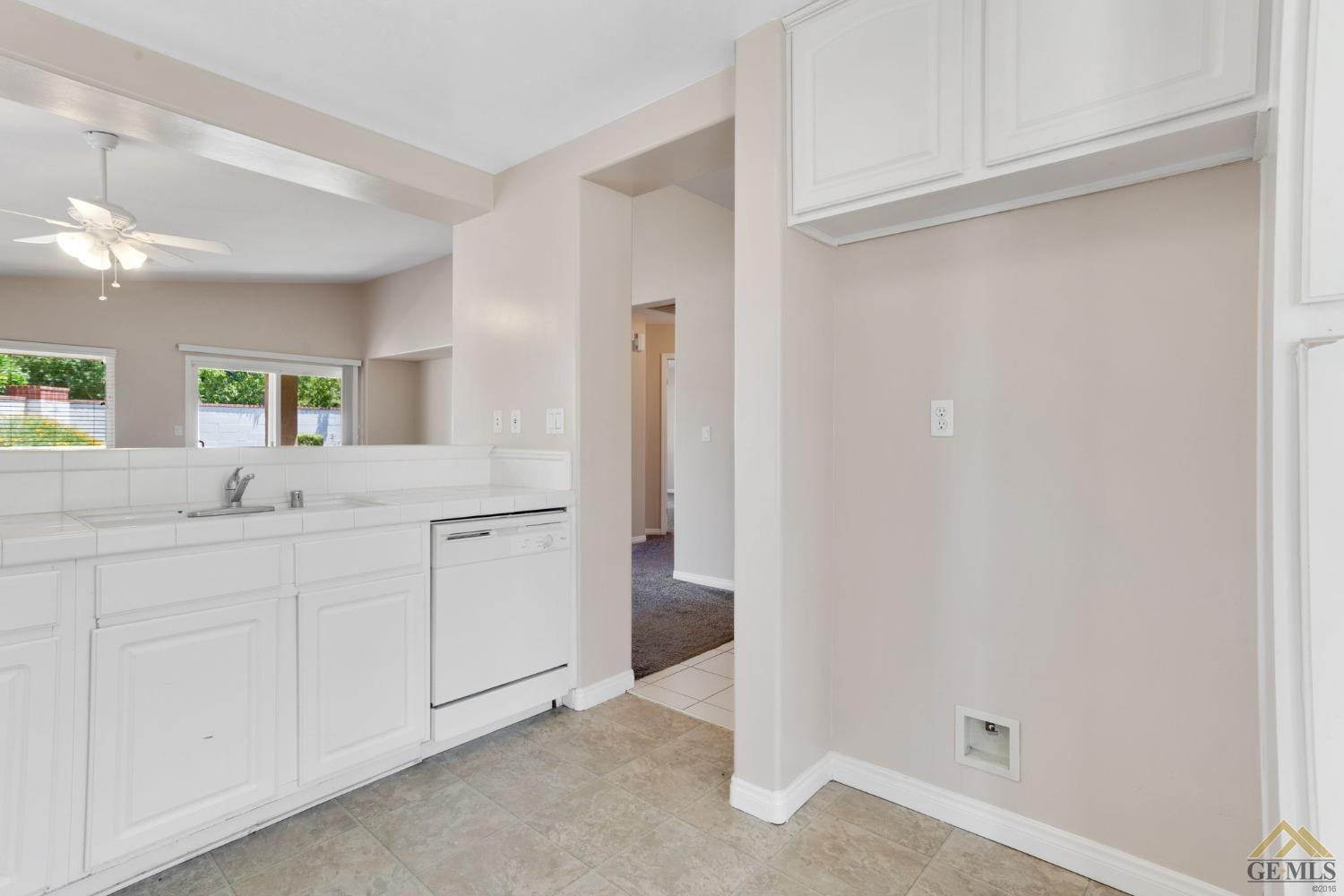 Undisclosed Address Bakersfield, CA 93311 - Photo 15 of 39 a bathroom with a double vanity sink and mirror