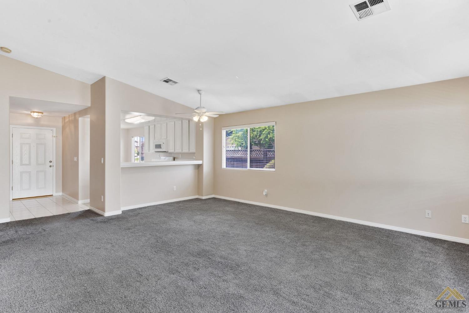 Undisclosed Address Bakersfield, CA 93311 - Photo 16 of 39 a view of an empty room with a window