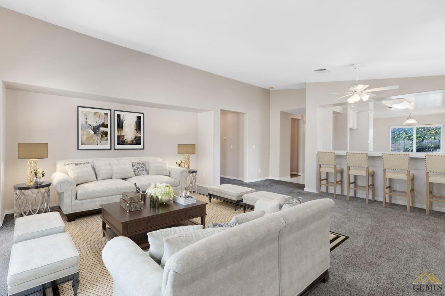 Undisclosed Address Bakersfield, CA 93311 - Photo 19 of 39 a living room with furniture and a large window