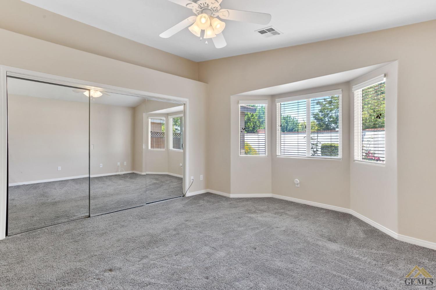 Undisclosed Address Bakersfield, CA 93311 - Photo 22 of 39 a view of an empty room with a window