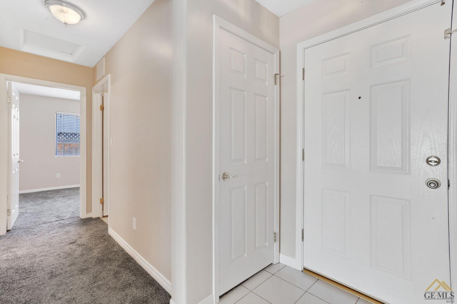 Undisclosed Address Bakersfield, CA 93311 - Photo 27 of 39 a view of a hallway with closet area