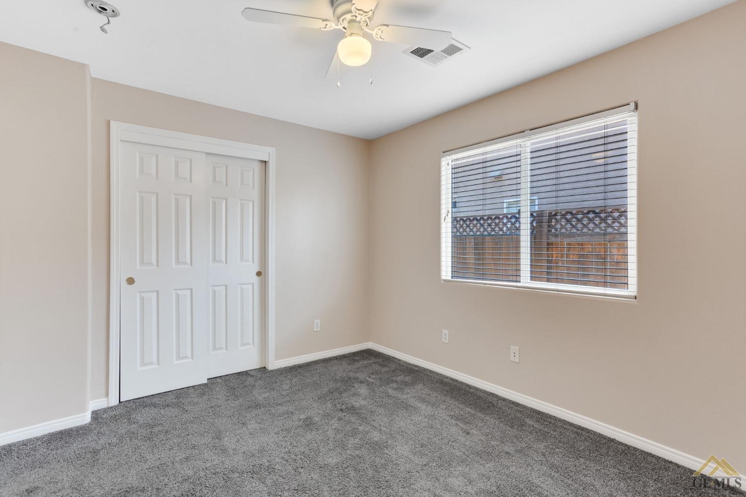Undisclosed Address Bakersfield, CA 93311 - Photo 31 of 39 a view of an empty room with a window