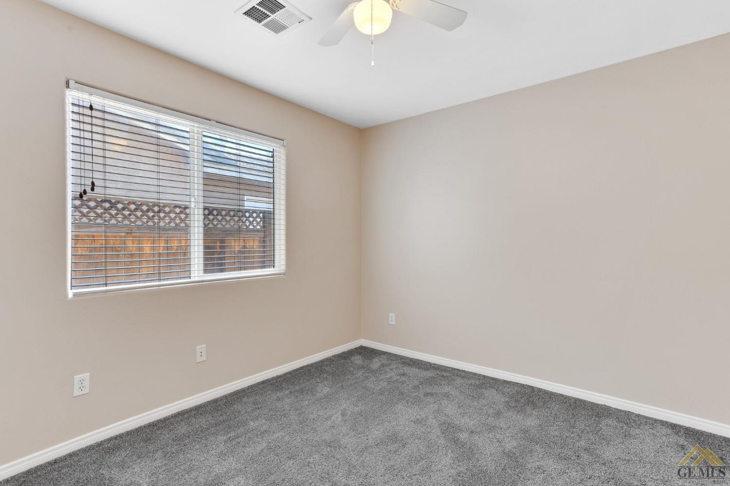 Undisclosed Address Bakersfield, CA 93311 - Photo 32 of 39 an empty room with a window