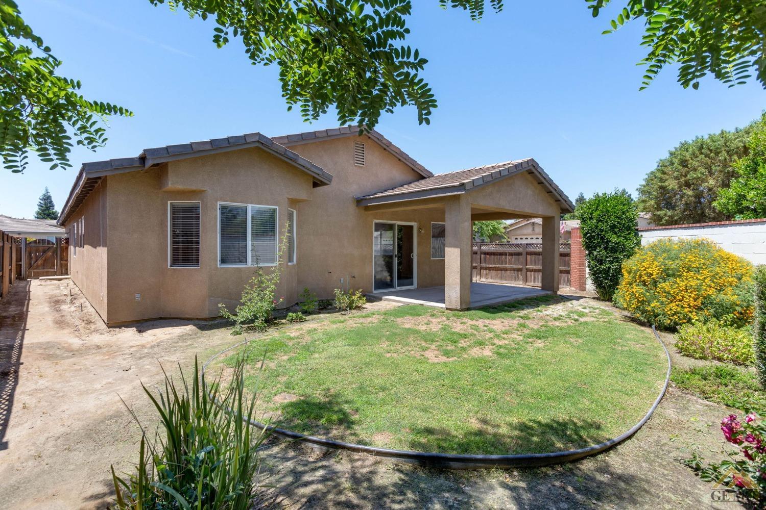 Undisclosed Address Bakersfield, CA 93311 - Photo 34 of 39 a view of a house with backyard