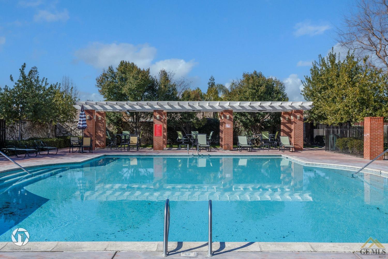 Undisclosed Address Bakersfield, CA 93311 - Photo 37 of 39 a view of swimming pool with trees in background
