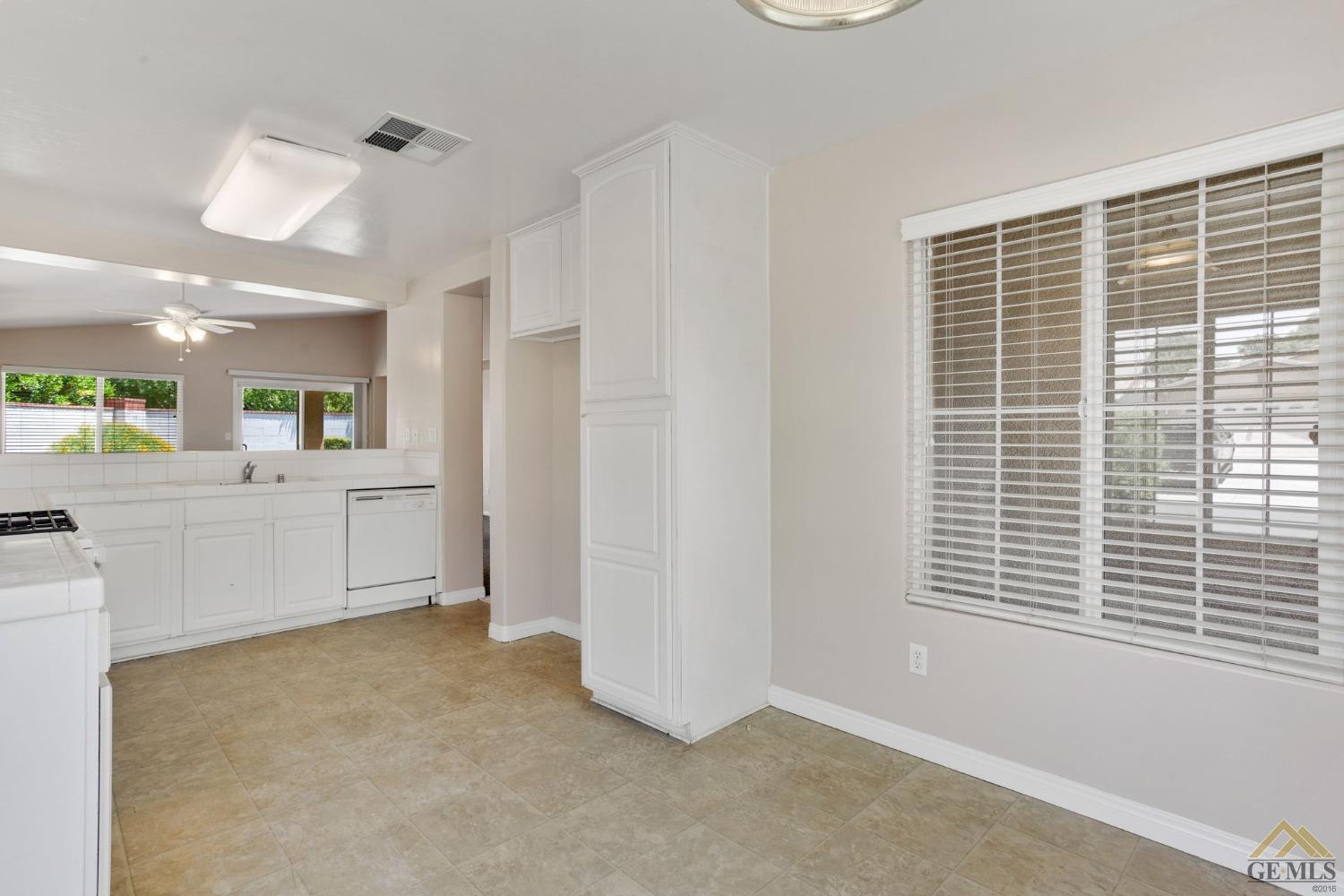 Undisclosed Address Bakersfield, CA 93311 - Photo 9 of 39 a view of a kitchen with a sink