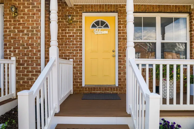 a view of a door and a street