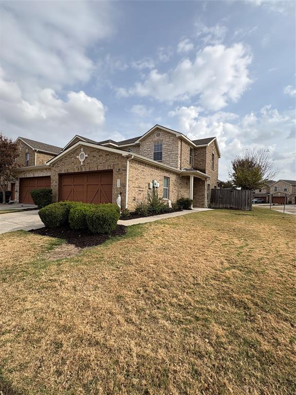 5900 Stone Mountain Road The Colony, TX 75056 - Photo 2 of 15 a front view of a house with a yard