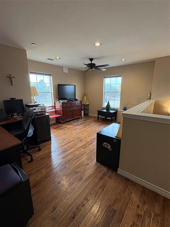 5900 Stone Mountain Road The Colony, TX 75056 - Photo 9 of 15 a living room with furniture flat screen tv and window