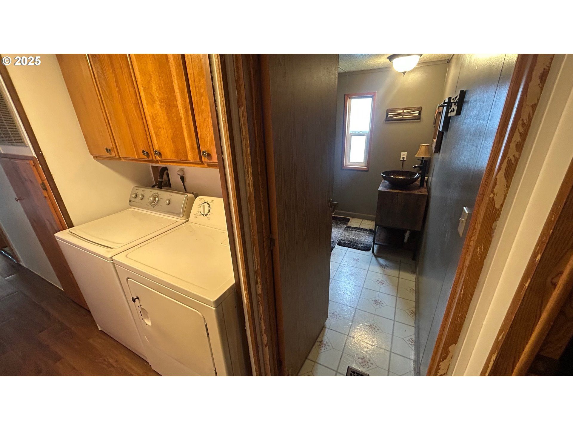 91323 Sandstone Lane, Unit 418 Coos Bay, OR 97420 - Photo 12 of 20 a open kitchen with sink and refrigerator