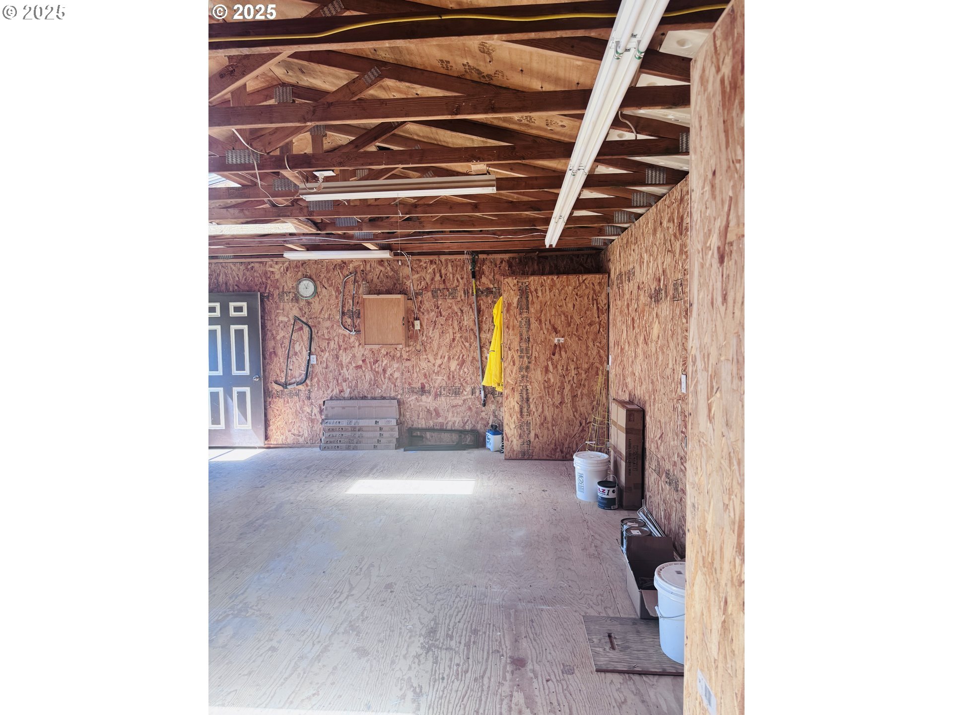 91323 Sandstone Lane, Unit 418 Coos Bay, OR 97420 - Photo 18 of 20 a view of an empty room with wooden floor