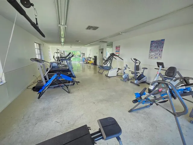 a view of a room with gym equipment