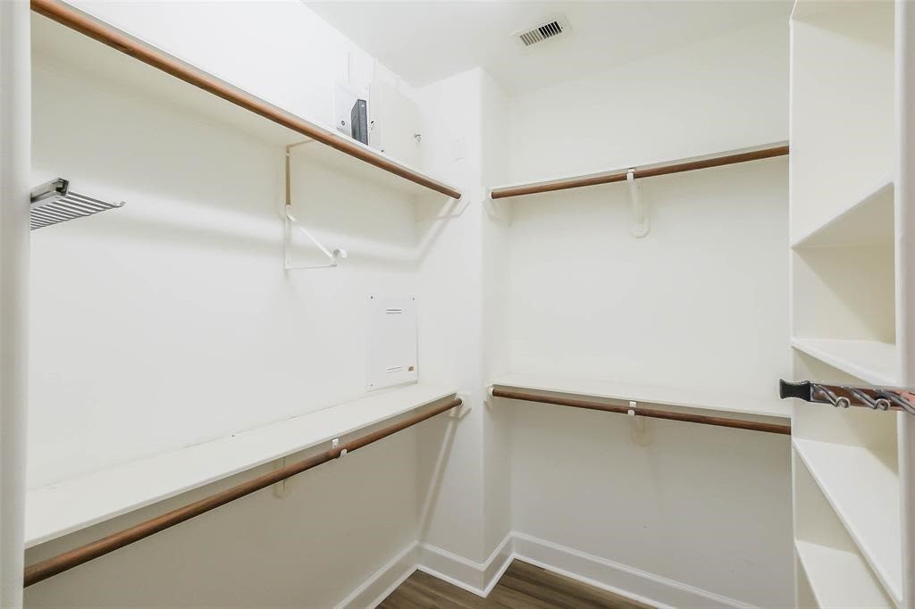 706 Allston Street, Unit B Houston, TX 77007 - Photo 17 of 33 a view of an empty walk in closet