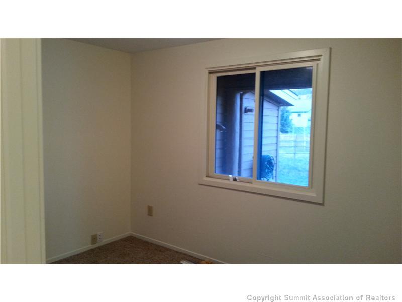 960 Mesa Drive Silverthorne, CO 80498 - Photo 11 of 25 a black and white photo of a living room