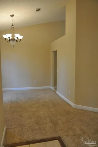 a view of a room with an empty space