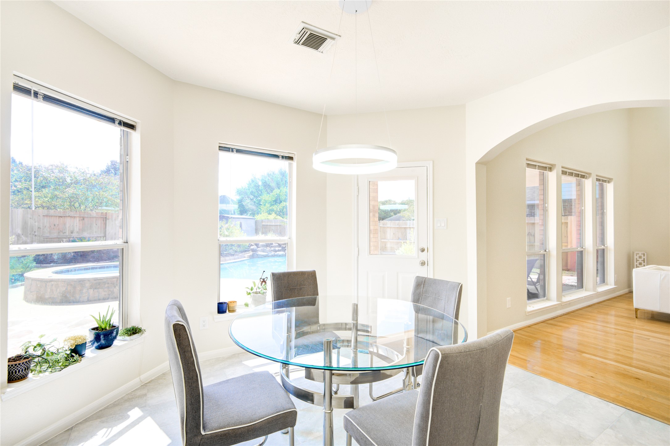 14411 Chartley Falls Drive Houston, TX 77044 - Photo 24 of 36 a view of a dining room with furniture window and wooden floor