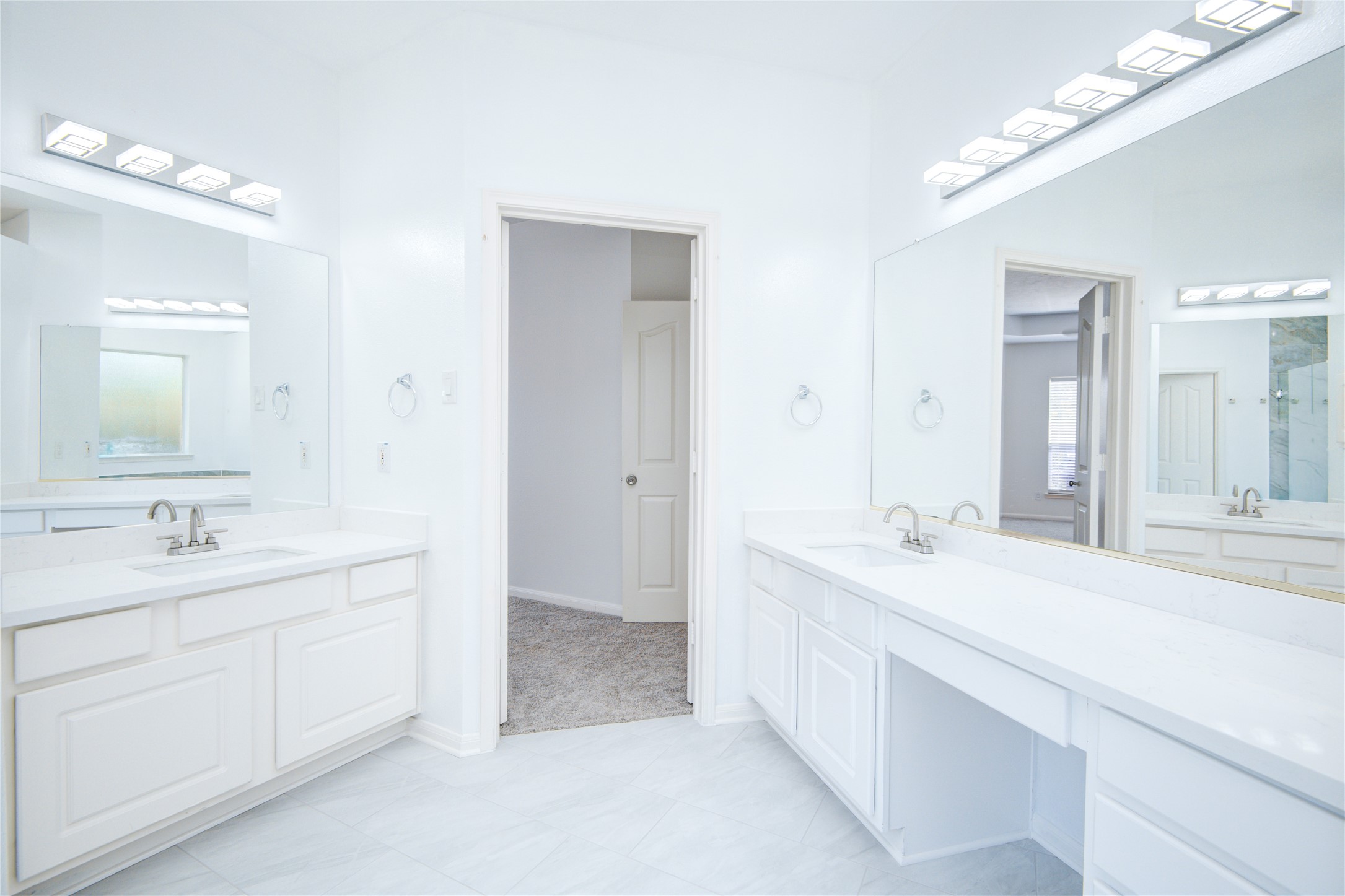 14411 Chartley Falls Drive Houston, TX 77044 - Photo 30 of 36 a bathroom with a sink double vanity and a mirror