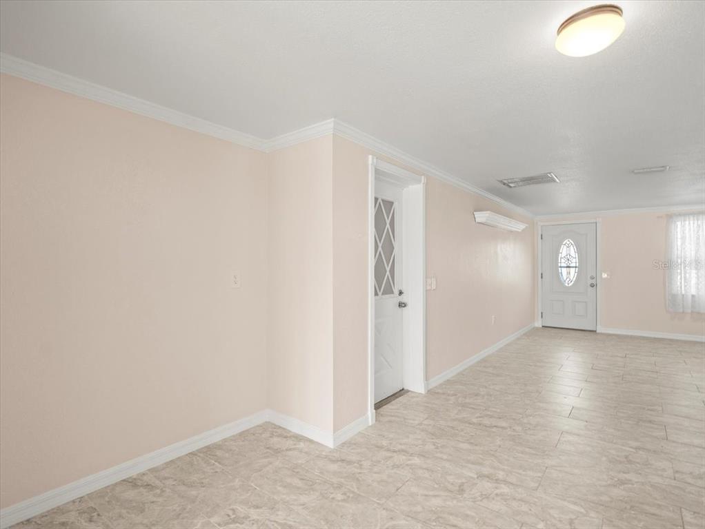 3408 Crape Myrtle Drive Hernando Beach, FL 34607 - Photo 15 of 46 a view of an empty room