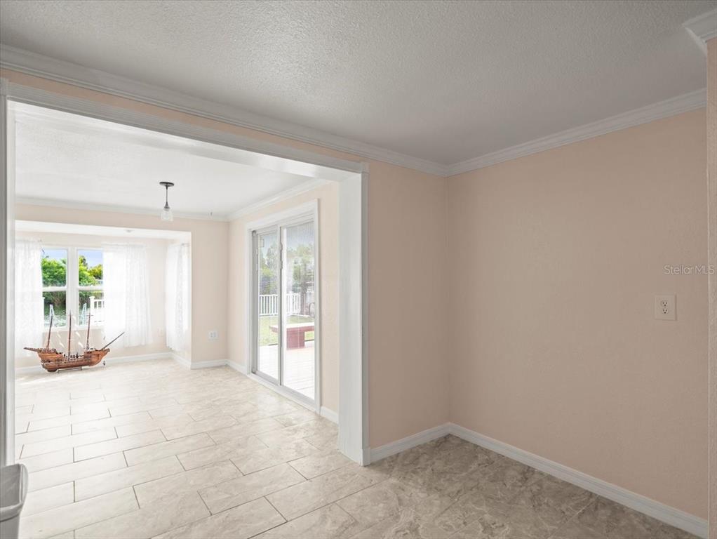 3408 Crape Myrtle Drive Hernando Beach, FL 34607 - Photo 16 of 46 a view of an empty room