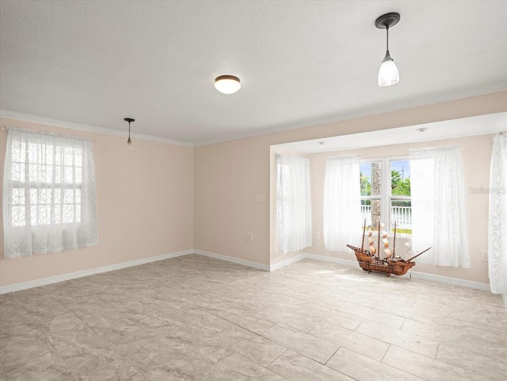 3408 Crape Myrtle Drive Hernando Beach, FL 34607 - Photo 17 of 46 a view of an empty room with a window