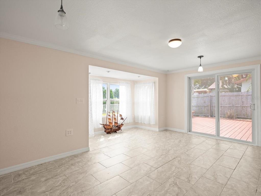 3408 Crape Myrtle Drive Hernando Beach, FL 34607 - Photo 18 of 46 a view of an empty room and window