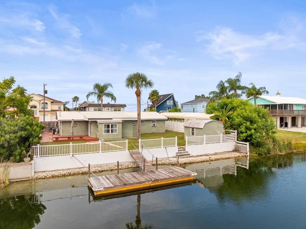 3408 Crape Myrtle Drive Hernando Beach, FL 34607 - Photo 2 of 46 a house with river in front of it