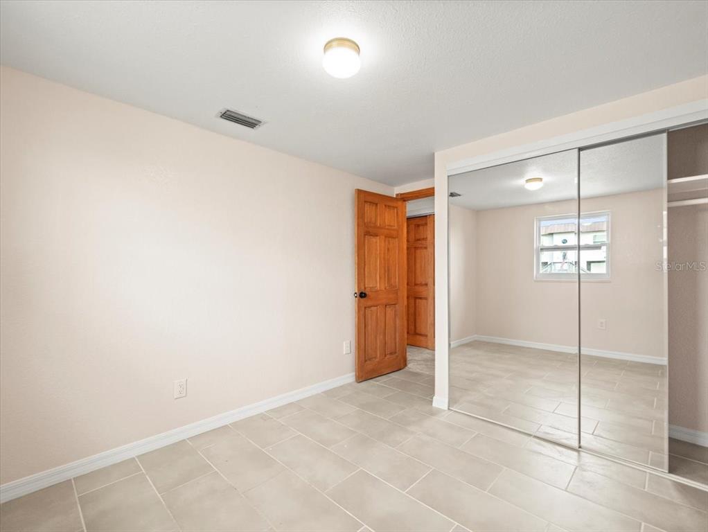 3408 Crape Myrtle Drive Hernando Beach, FL 34607 - Photo 23 of 46 a view of an empty room