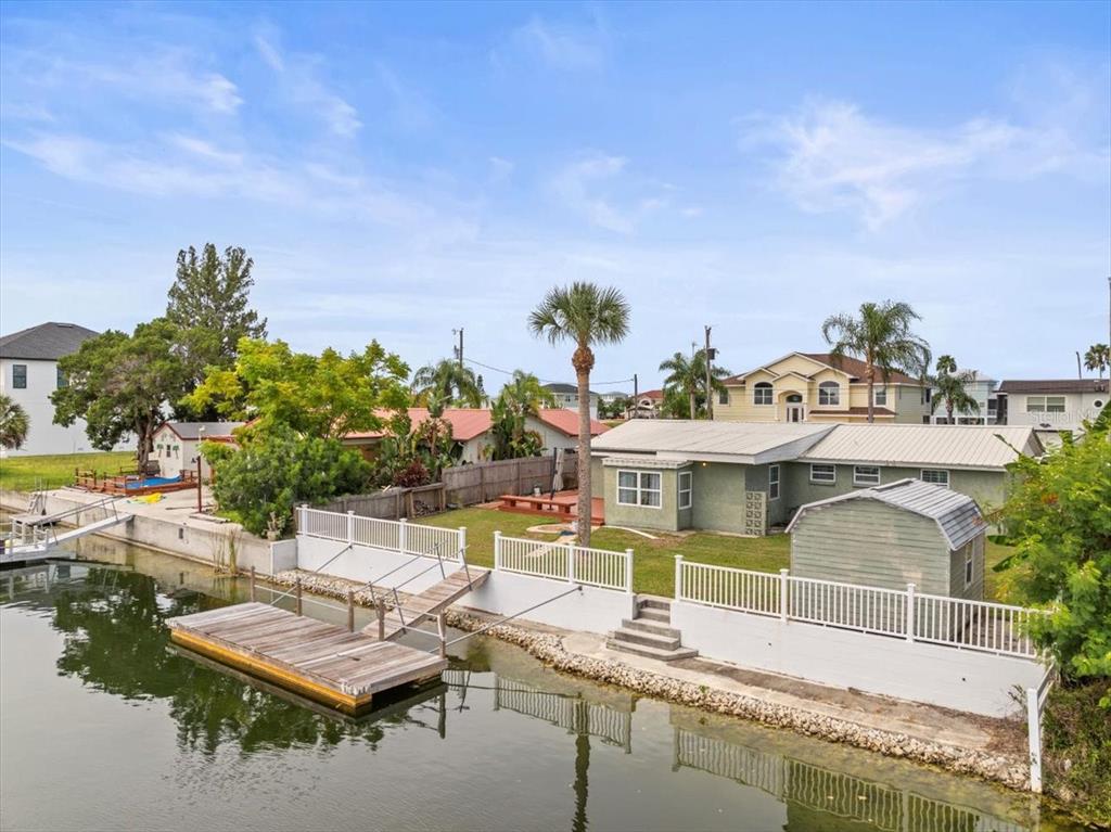 3408 Crape Myrtle Drive Hernando Beach, FL 34607 - Photo 33 of 46 a view of a swimming pool with outdoor seating