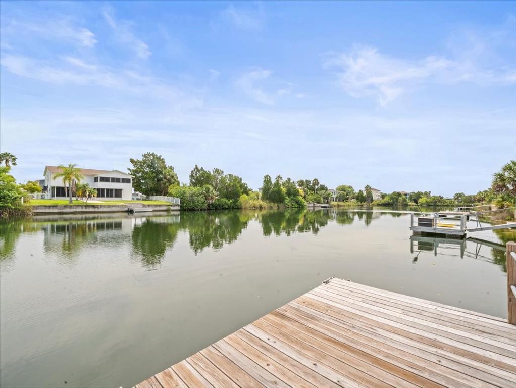3408 Crape Myrtle Drive Hernando Beach, FL 34607 - Photo 35 of 46 a view of a lake with houses