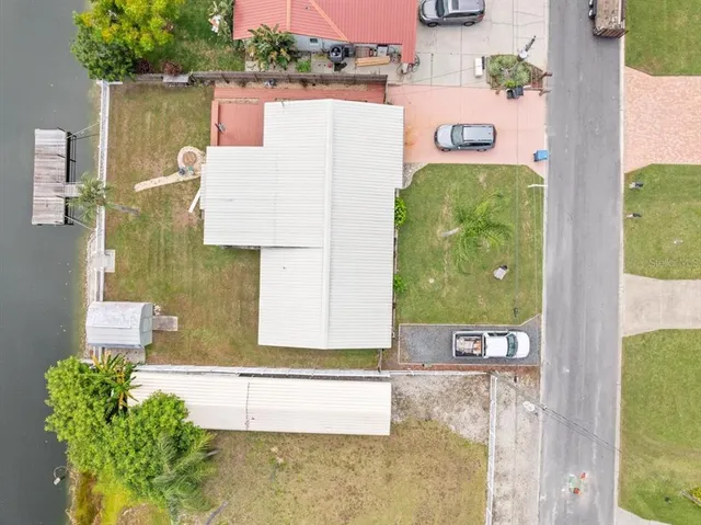 a bathroom with a bathtub and mirror