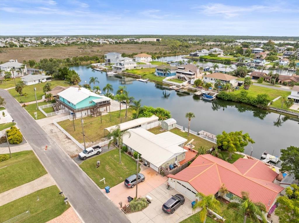 3408 Crape Myrtle Drive Hernando Beach, FL 34607 - Photo 42 of 46 an aerial view of a residential houses with outdoor space