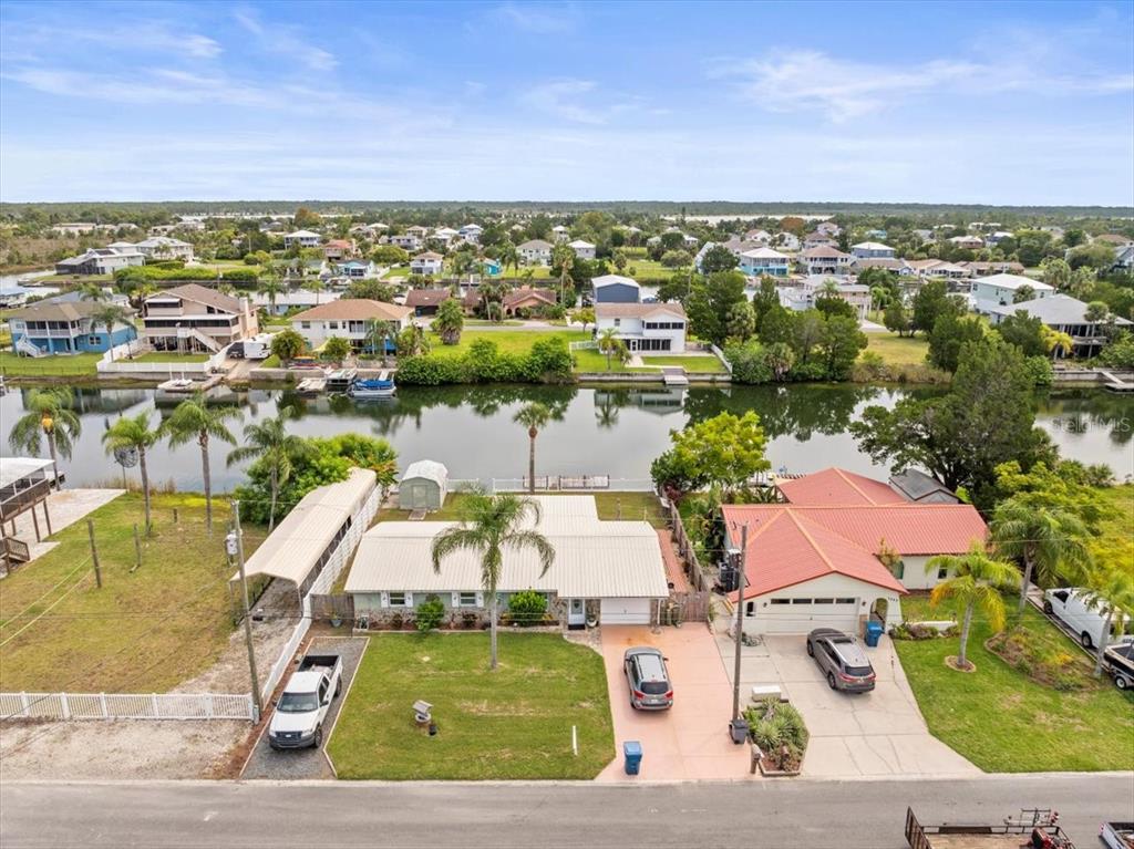 3408 Crape Myrtle Drive Hernando Beach, FL 34607 - Photo 46 of 46 an aerial view of residential houses with outdoor space
