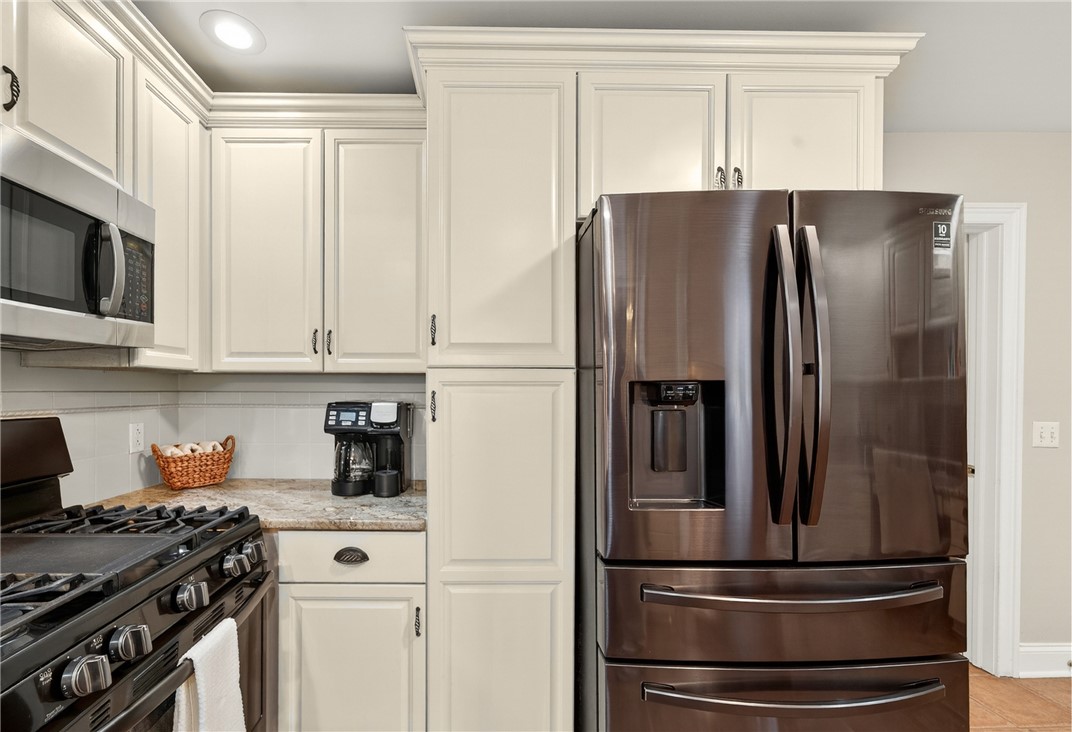 439 Rock Beach Road Irondequoit, NY 14617 - Photo 15 of 49 Black stainless-steel appliances: gas stove/oven,