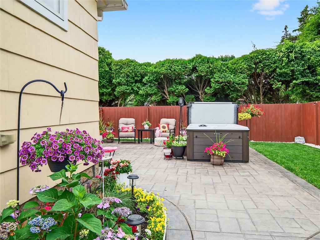 439 Rock Beach Road Irondequoit, NY 14617 - Photo 28 of 49 Cedar stockade fence and stamped concrete.