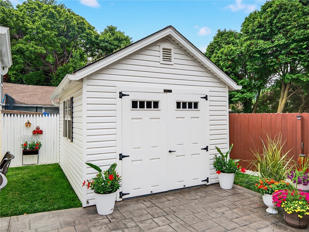 439 Rock Beach Road Irondequoit, NY 14617 - Photo 35 of 49 10x12 Insulated Shed has vinyl siding, gutters, ru