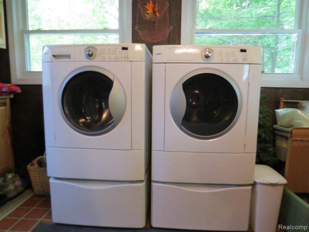 11208 Hall Road Whitmore Lake, MI 48189 - Photo 21 of 30 entry level laundry room, large space used for entry room and general utility