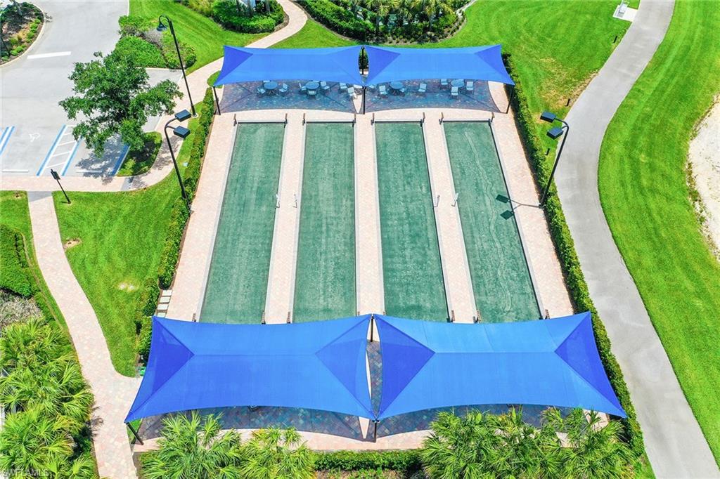 7638 Jacaranda Lane Naples, FL 34114 - Photo 36 of 50 a view of a yard with plants